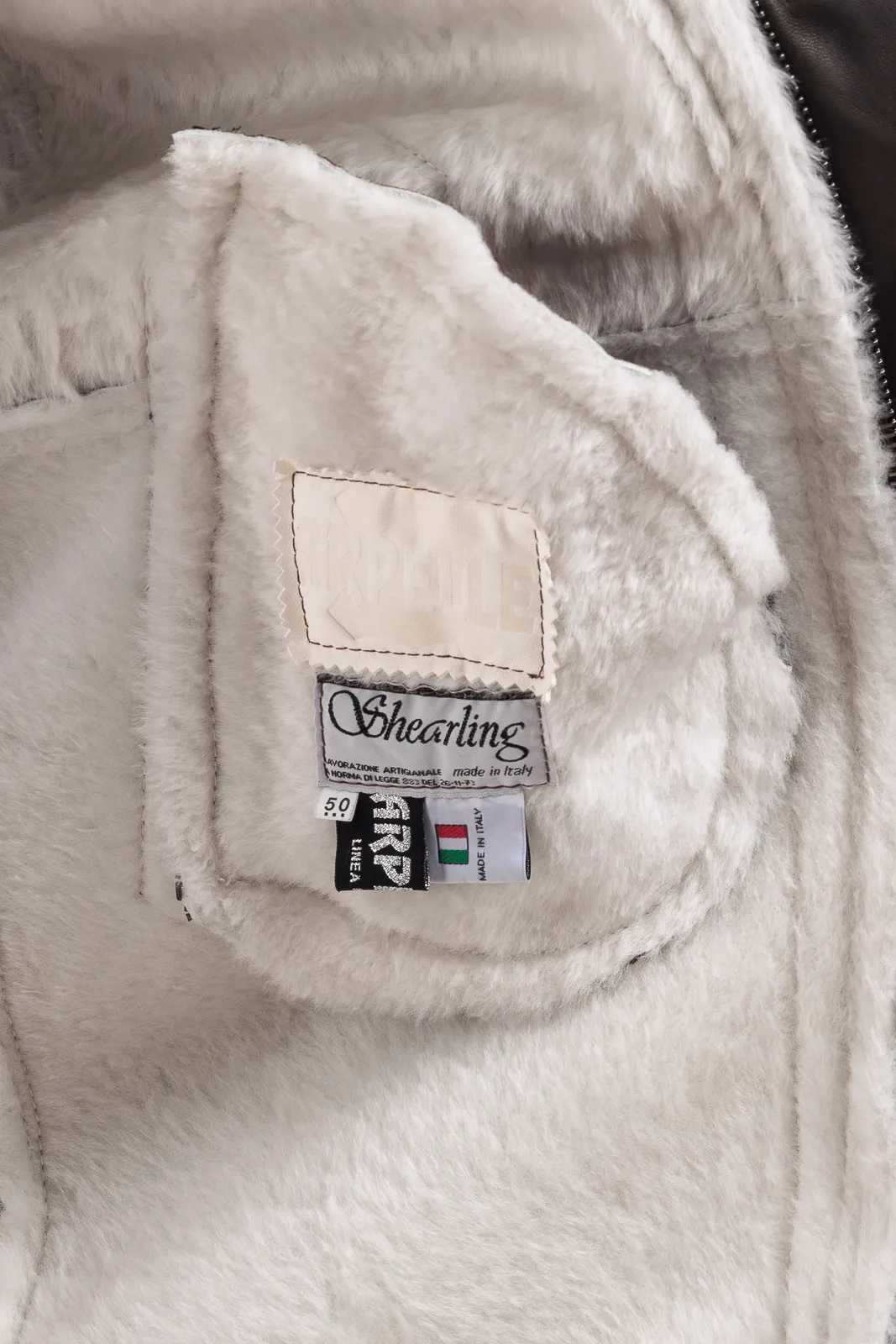 Brown genuine sheepskin coat with white fur and buttons