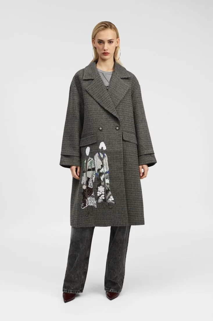  Coat with embroidered designs and buttons    