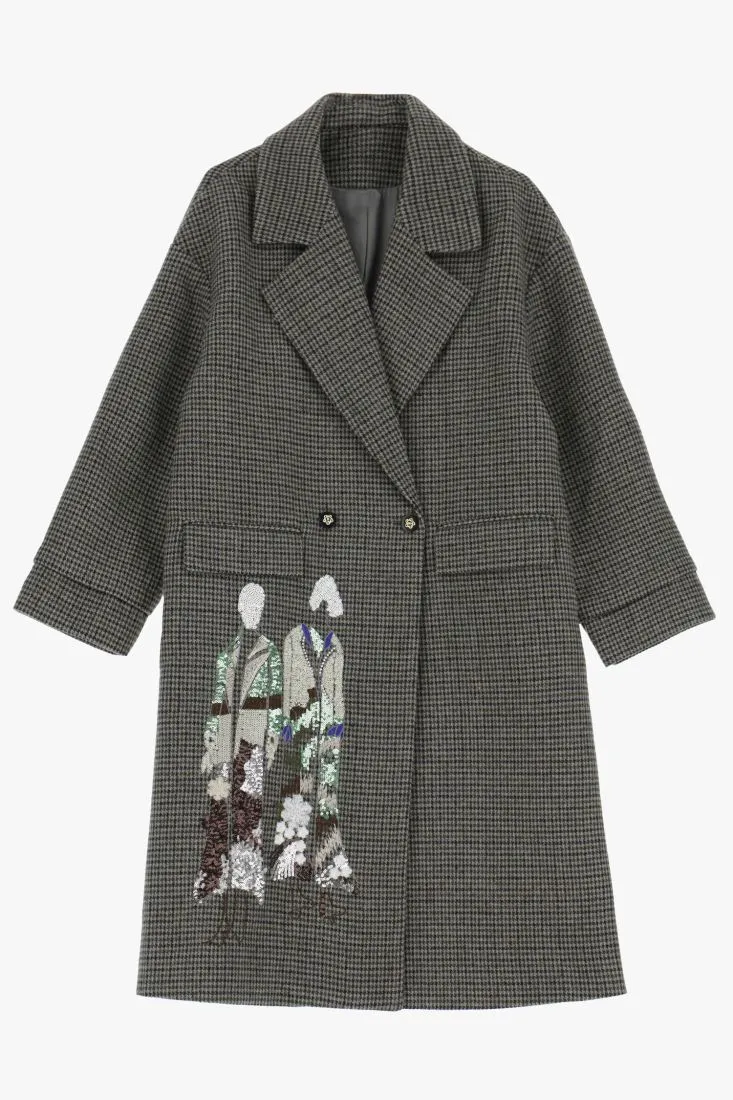  Coat with embroidered designs and buttons    