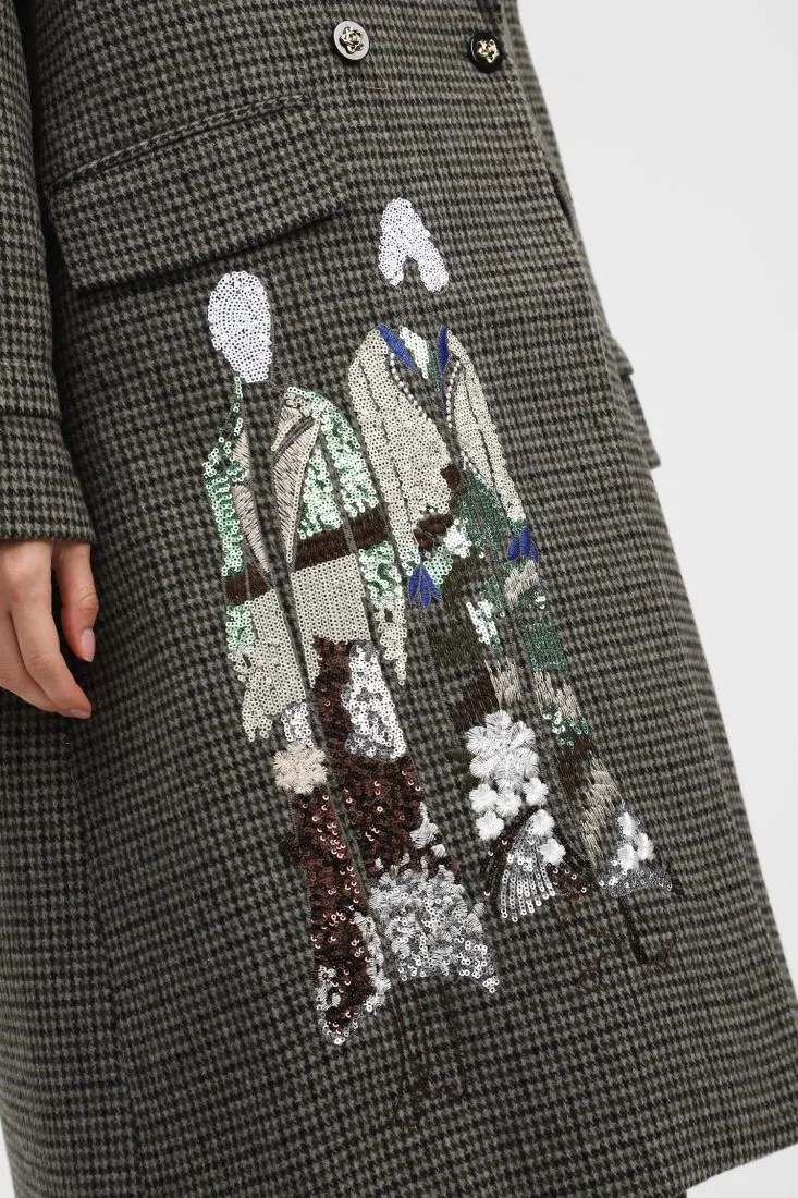  Coat with embroidered designs and buttons    