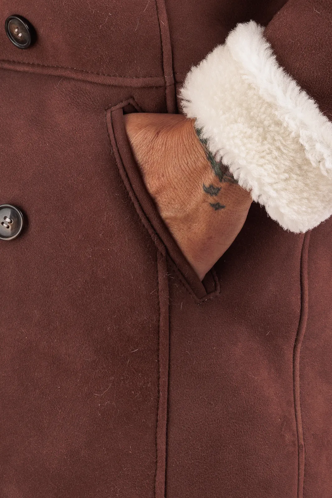 Rust sheepskin double-breasted coat with white fur