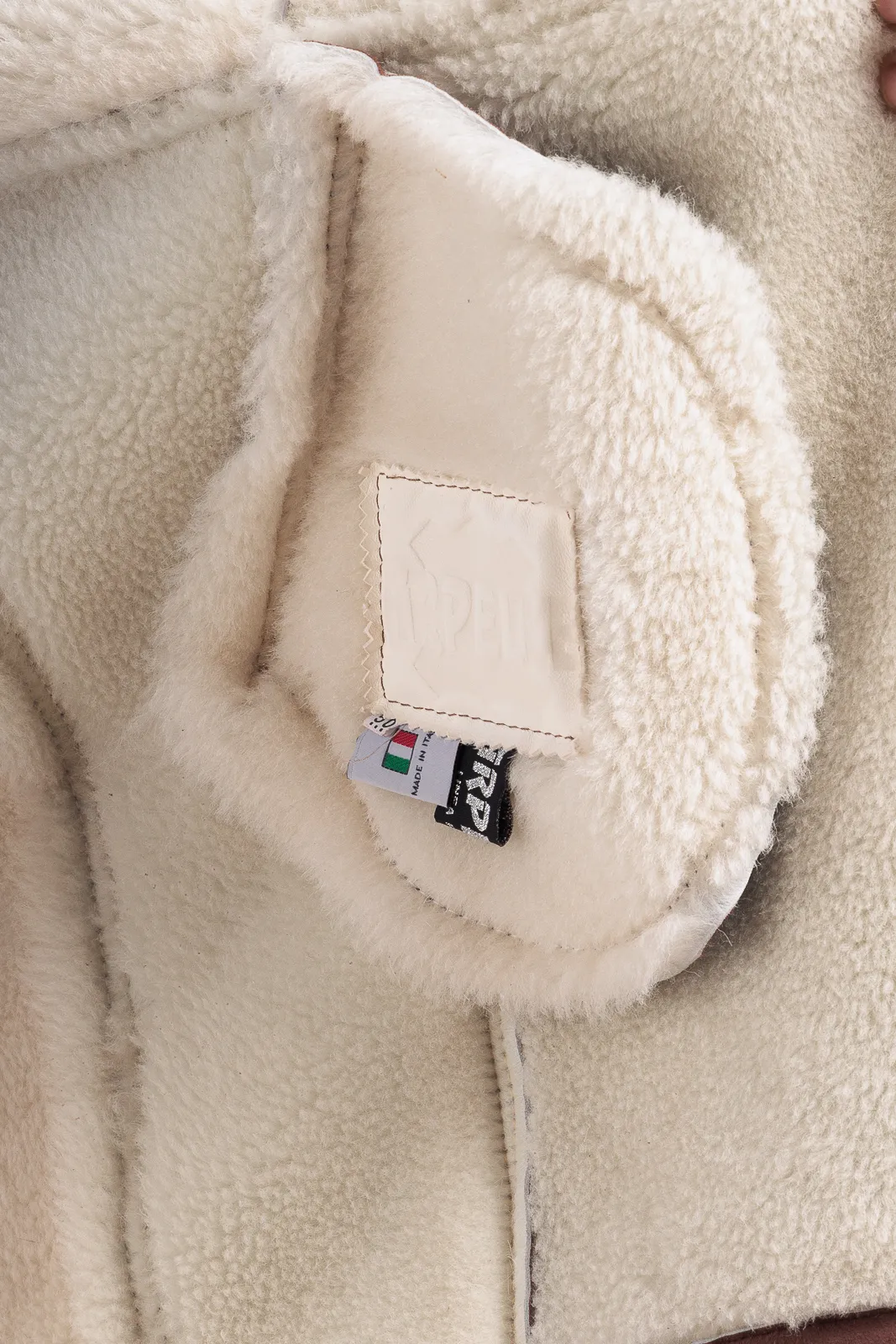 Rust sheepskin double-breasted coat with white fur